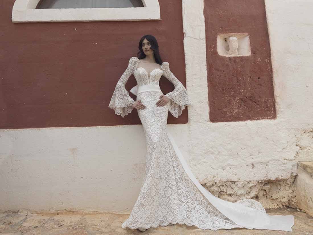 Abito da sposa Pietro De Mita a sirena in pizzo con maniche svasate