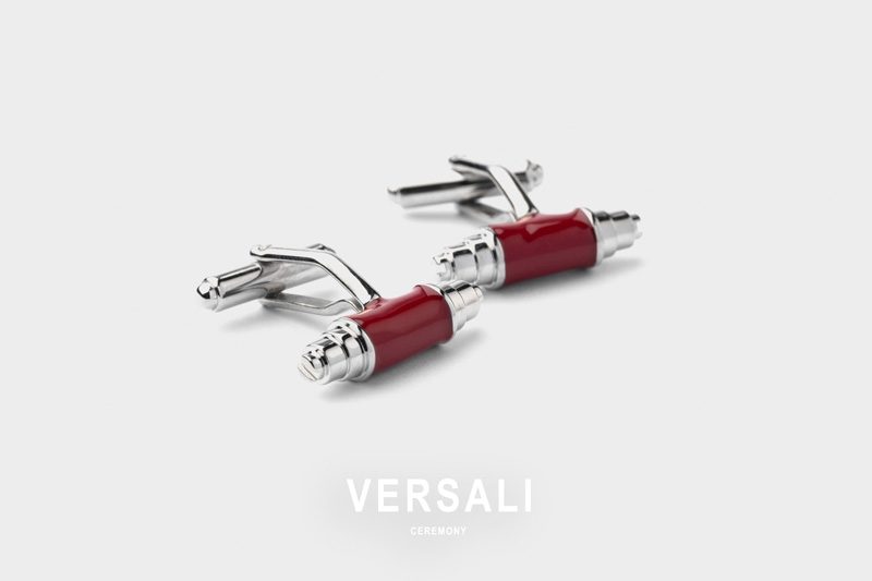 Gemelli a barra Andrea Versali con smalto rosso